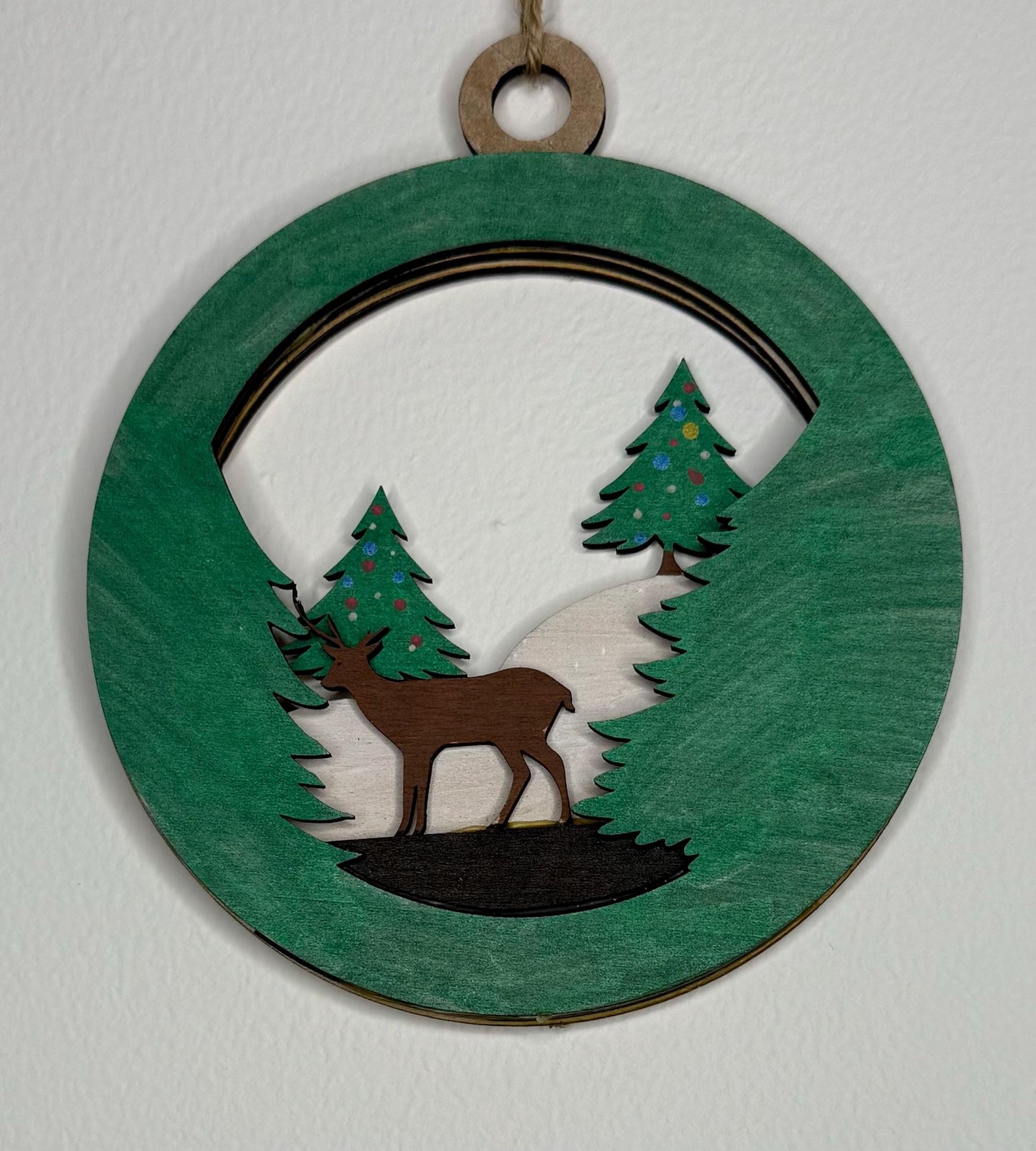 Handcrafted Wooden Deer Ornament for Holiday Decor - Festive Forest Scene with Evergreen Trees