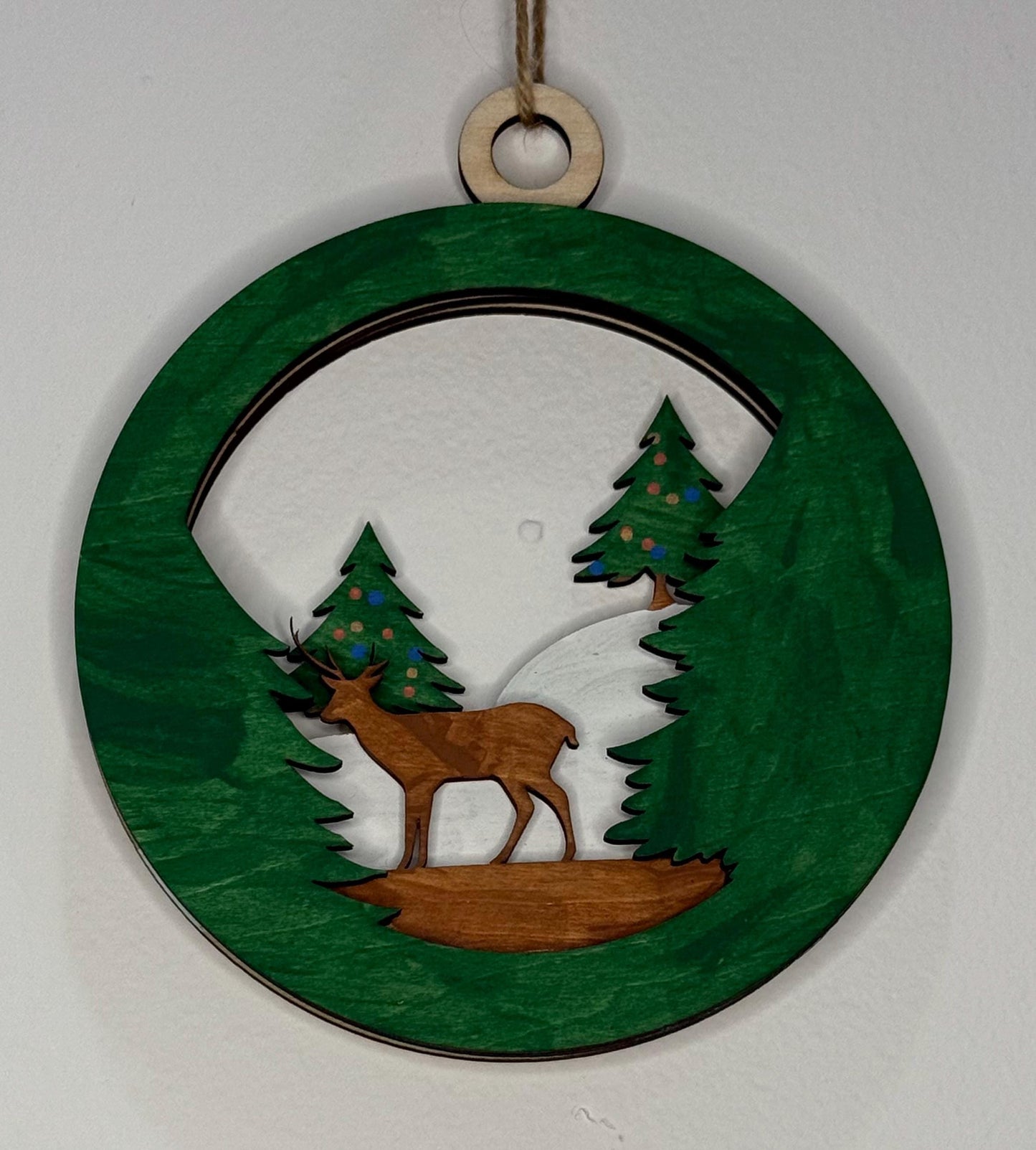 Handcrafted Wooden Deer Ornament for Holiday Decor - Festive Forest Scene with Evergreen Trees